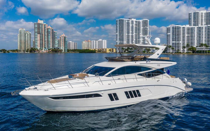 65' Sea Ray Fly luxury charter yacht - Duffy's Sports Grill, Northeast 163rd Street, North Miami Beach, FL, USA